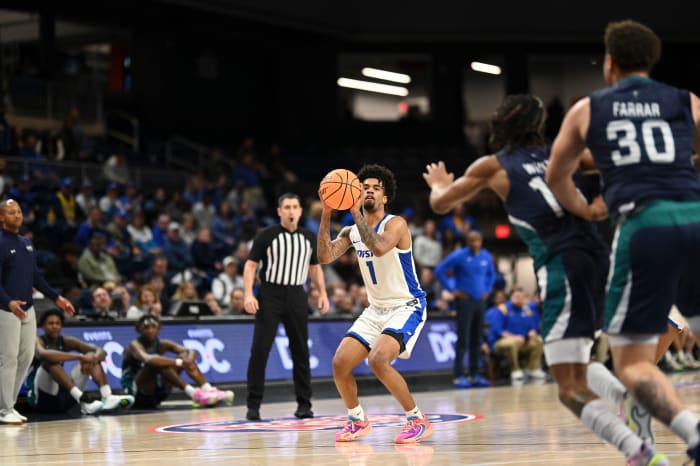 Mar 6, 2023; Washington, D.C., USA; Hofstra Pride guard Aaron Estrada (1) spots to to take a three point shot during the first half against the North Carolina-Wilmington Seahawks of CAA Tournament Semifinals at Entertainment & Sports Arena. Mandatory Credit: Tommy Gilligan-USA TODAY Sports